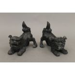A pair of bronze dogs-of-fo. 15 cm long.