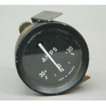 An instrument dial, possibly from an old aircraft. 5.5 cm diameter.