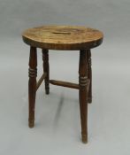 A 19th century mahogany stool