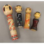 Four Kokeshi dolls. The largest 38 cm high.