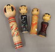 Four Kokeshi dolls. The largest 38 cm high.