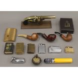 A quantity of lighters, pipes, etc.