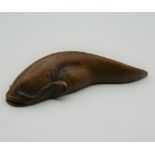 A bronze model of a catfish. 5.5 cm long.