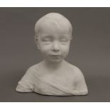 A plaster bust of a child. 26 cm high.