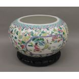 A Chinese porcelain vase on stand. 29 cm diameter.