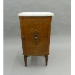 A 19th century French marble topped pot cupboard. 84 cm high.