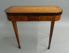 A 19th century crossbanded mahogany and satinwood card table. 89.5 cm wide.