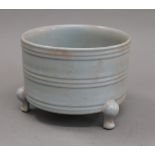 A Chinese light blue porcelain censer. 13 cm high.
