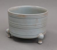 A Chinese light blue porcelain censer. 13 cm high.