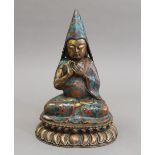A cloisonne decorated bronze model of Buddha. 27 cm high.