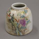 A small Chinese porcelain ink pot. 6 cm high.
