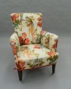 A Victorian upholstered armchair. 92 cm high.