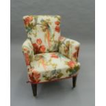 A Victorian upholstered armchair. 92 cm high.