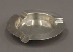A silver ashtray. 10.5 cm diameter. 83.2 grammes.