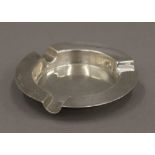 A silver ashtray. 10.5 cm diameter. 83.2 grammes.