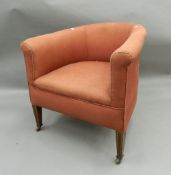 An early 20th century tub armchair. 65 cm wide.