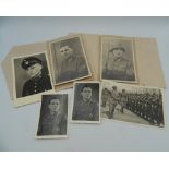 A small quantity of WWII German military photographs and a postcode of Adolf Hitler