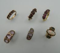 Three 9 ct gold stone set rings,