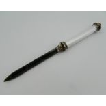 A silver enamel and jade letter opener, bearing Russian marks. 26 cm long.