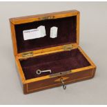 An Edwardian mahogany inlaid trinket box. 15 cm wide.