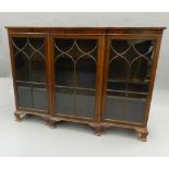 An early 20th century mahogany glazed bookcase. 154 cm wide.