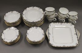 A quantity of various dinner and tea wares, including Wedgwood and Royal Doulton.
