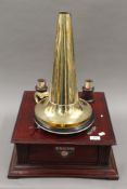 A double horn gramophone.