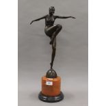 An Art Deco style bronze dancer. 53 cm high.