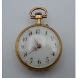 An 18 ct gold ladies fob watch. 2.5 cm diameter. 15.6 grammes total weight.