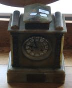 A Victorian onyx mantle clock. 29 cm high.