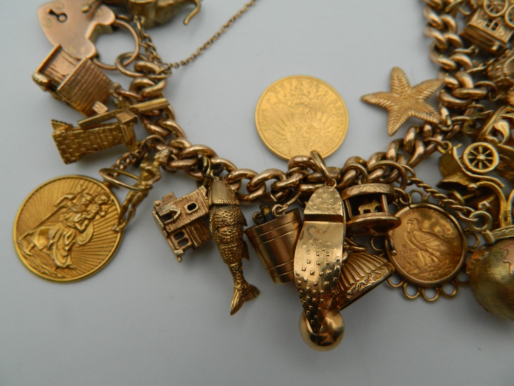 A 9 ct gold charm bracelet, set with various gold coins, including two sovereigns. 218. - Image 5 of 20