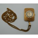 An Emka pendant watch on chain. The pendant 3.25 cm high.