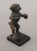 A cold painted bronze model of a boxing dog. 8 cm high.
