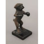 A cold painted bronze model of a boxing dog. 8 cm high.