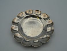 A white metal pin dish. 7.5 cm diameter. 23.8 grammes.