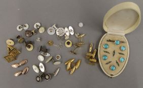 A quantity of vintage cufflinks and a cased set of studs.