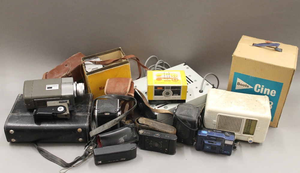 A quantity of various cameras, etc.