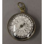 A vintage brass compass. 3.75 cm diameter.