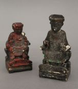 Two small Chinese wooden figures. The largest 13 cm high.