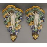 A pair of Maiolica wall brackets. Each 42 cm high.