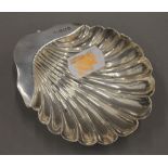 A small silver butter shell. 8 cm wide. 34 grammes.