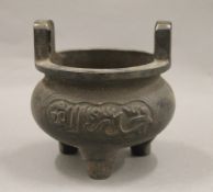 An archaic style Chinese bronze censer. 10 cm high.