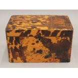 A 19th century Japanese lacquered tortoiseshell tea caddy. 19.5 cm wide.