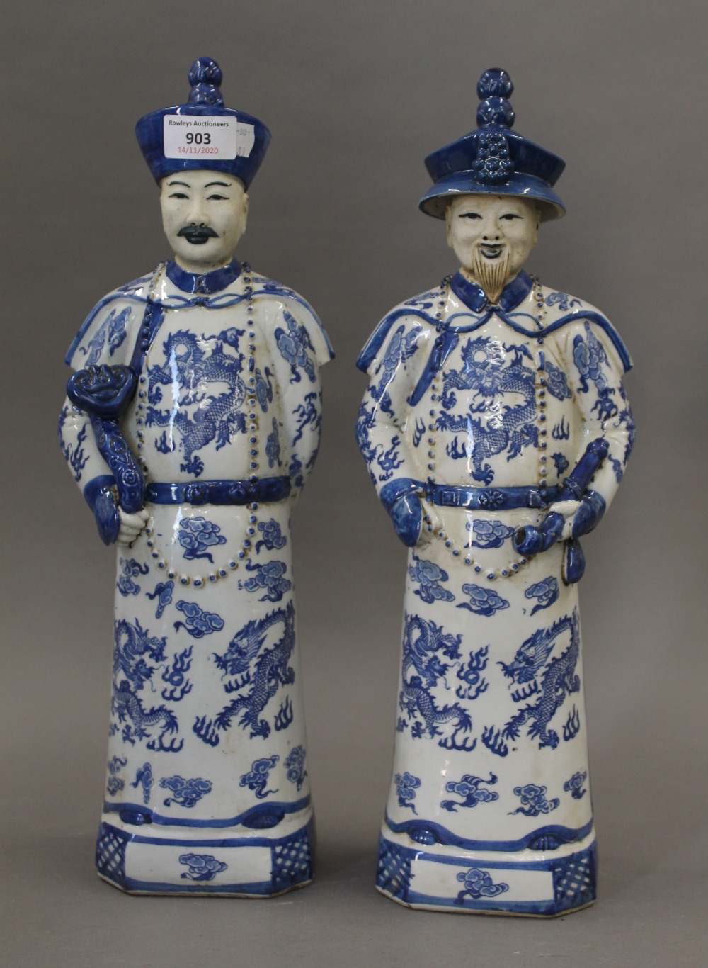 A pair of Chinese porcelain blue and white figures. The largest 43.5 cm high.