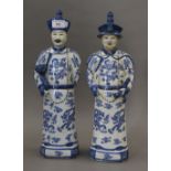 A pair of Chinese porcelain blue and white figures. The largest 43.5 cm high.