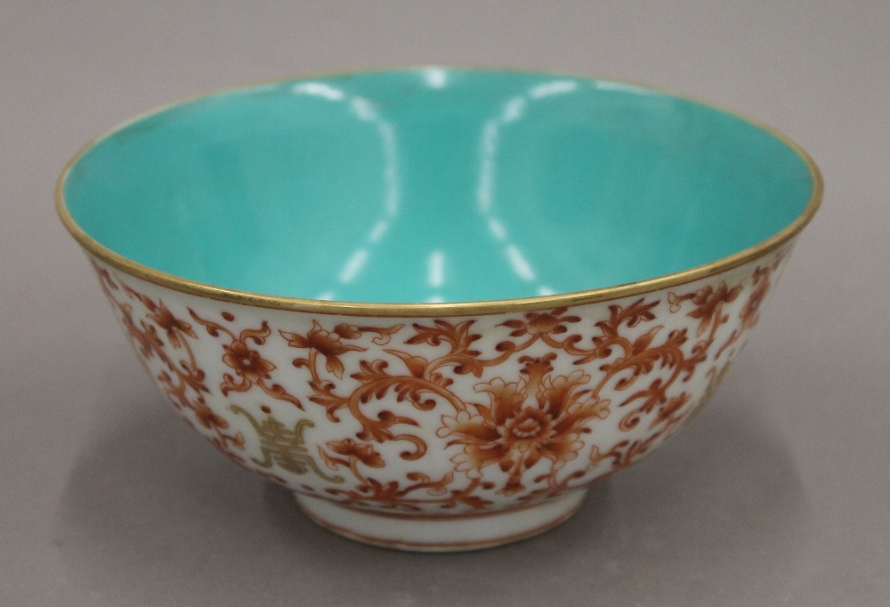 A Chinese turquoise and red porcelain bowl. 16 cm diameter.