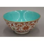 A Chinese turquoise and red porcelain bowl. 16 cm diameter.