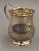 A silver Christening mug. 9.5 cm high. 3.6 troy ounces.