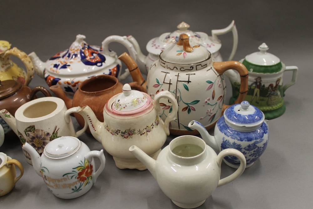 A collection of 19th century porcelain teapots - Image 6 of 12