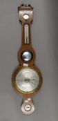 A 19th century mahogany banjo barometer.